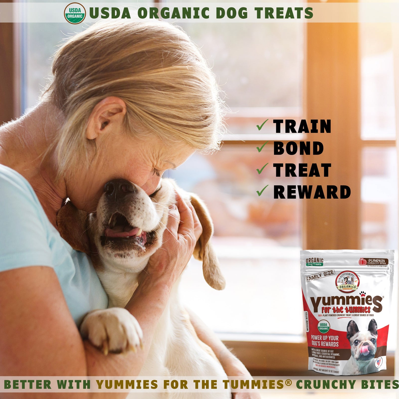 A person holding a dog next to a bag of pumpkin healthy dog treats Yummies for the Tummies by Momma Knows Best